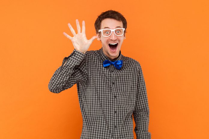 Portrait Of Funny Excited Man Nerd Waving His Hand, Showing Hell