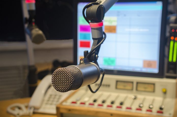 For radio stations: microphone and audio console in the studio