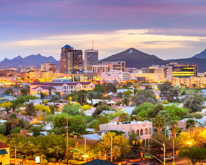 Tucson, Arizona, USA downtown city skyline with mountains at twi