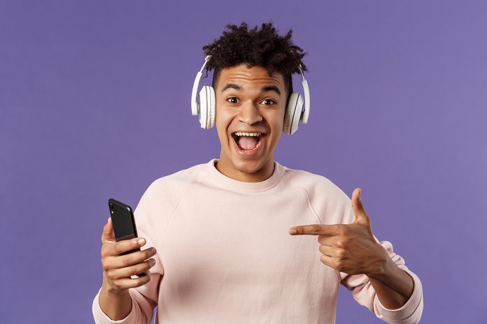 Technology And Lifestyle Concept. Portrait Of Happy, Cheerful Yo