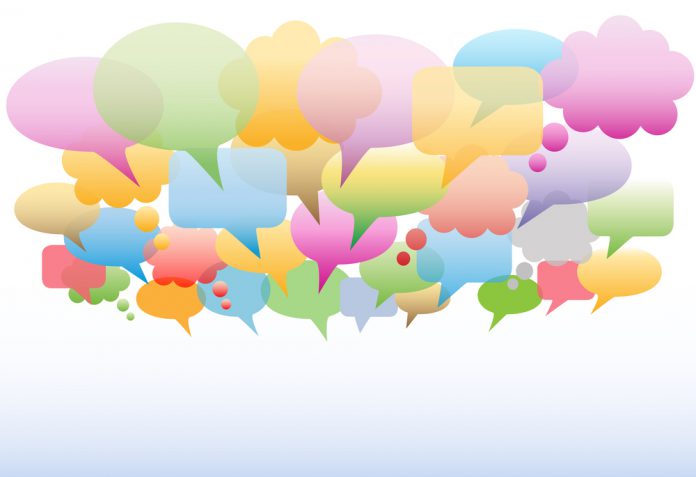 A social media cloud of many speech and thought bubbles transluc