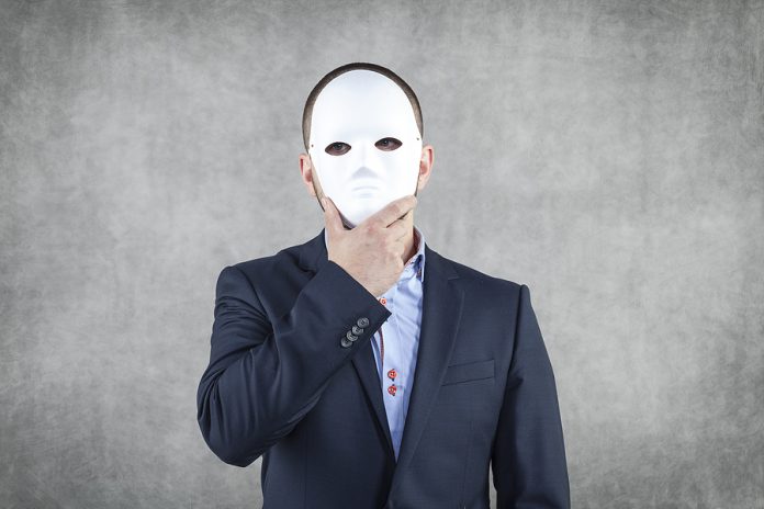Businessman Hidden Behind The Mask
