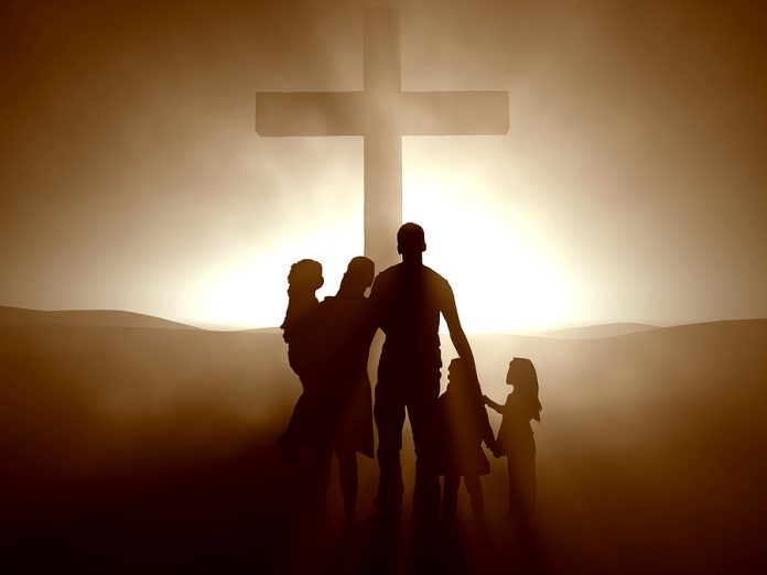 Family at the Cross of Jesus Christ