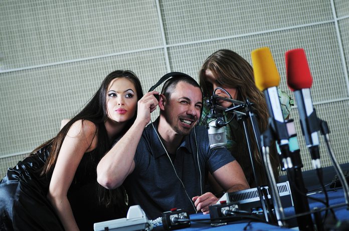 young people group indoor in music radio studio