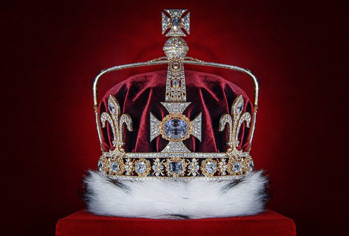 Crown. Golden Crown On Red Velvet Background.