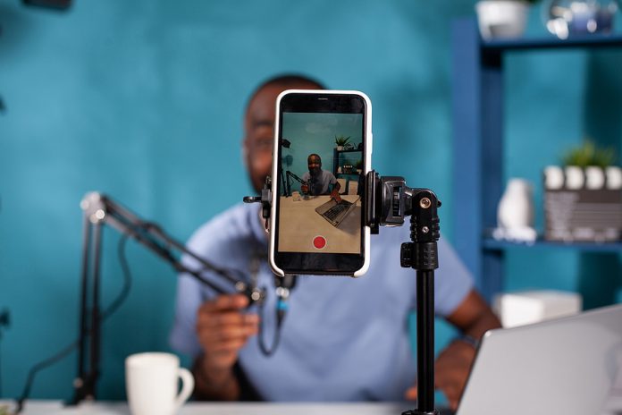 Closeup Of Recording Smartphone Filming Content Creator Feeling