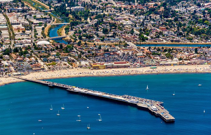 The Aerial View Of The City Of Santa Cruz With Its Beach In Nort
