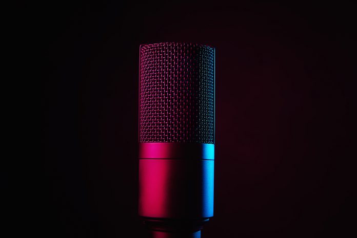 Studio Microphone On Dark Background With Copy Space. Black Prof