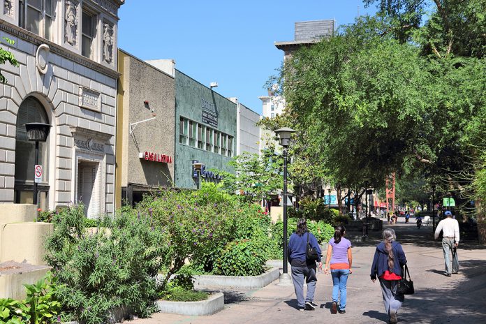 Fresno, United States - April 12, 2014: People Walk In Fresno, C
